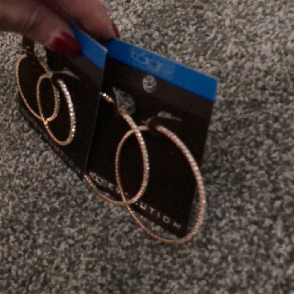 Small studded hoops and a large pair of studded hoops. 2 pairs